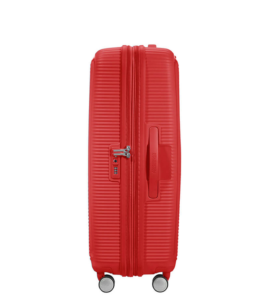 Большой чемодан American Tourister 32G*10003 Soundbox Spinner (77 см) - Coral Red